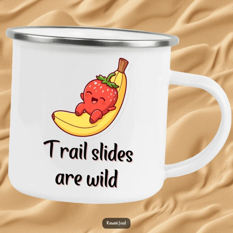 Funny camping mug showing a smiling strawberry character gleefully sliding down a banana peel, ready for any outdoor treat.