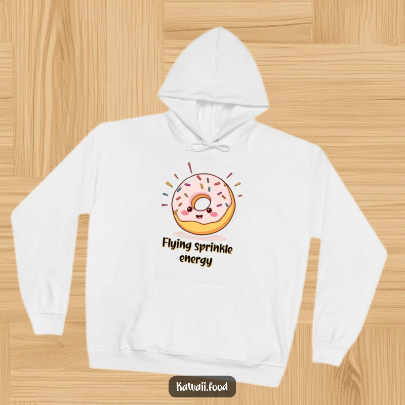 Cheerful donut character with sprinkles comically flying off its sides, featured on a cozy hoodie for ultimate comfort and sweet laughs.