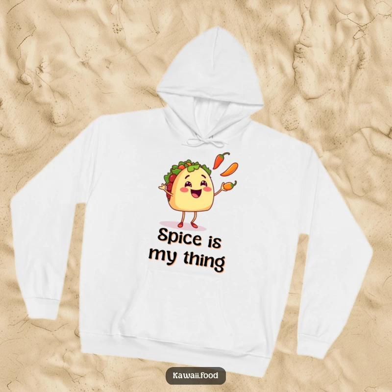 Funny smiling taco character with tiny legs juggling three colorful chili peppers, bringing warmth and humor to this hoodie.